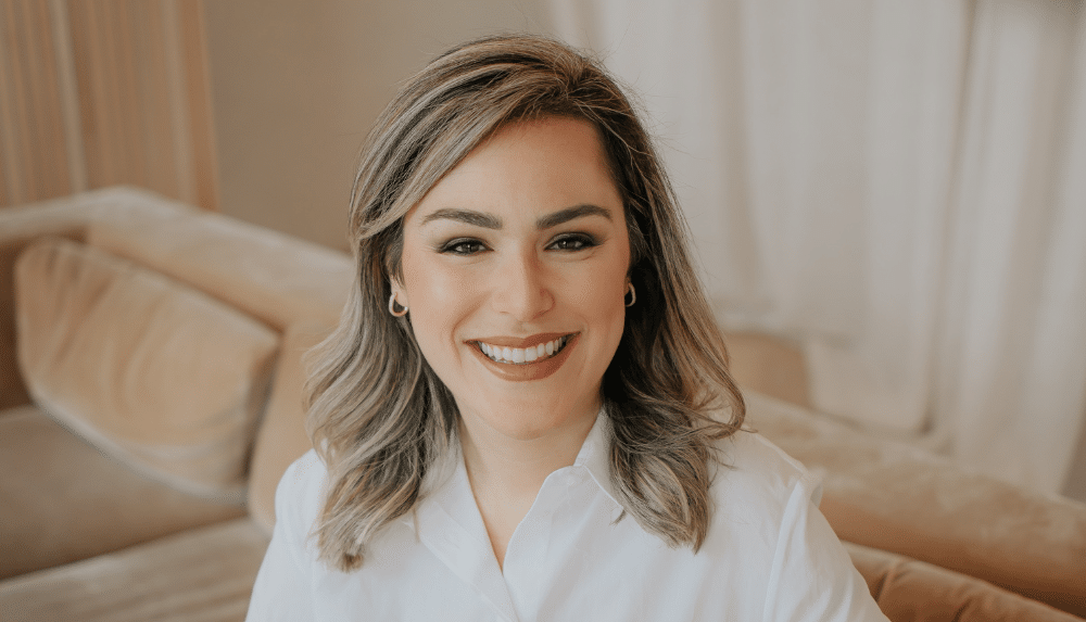 Person with light hair in white shirt