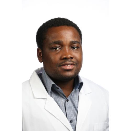 Person in a lab coat.