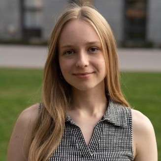 Woman with long hair outdoors.