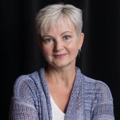 Person with short light hair