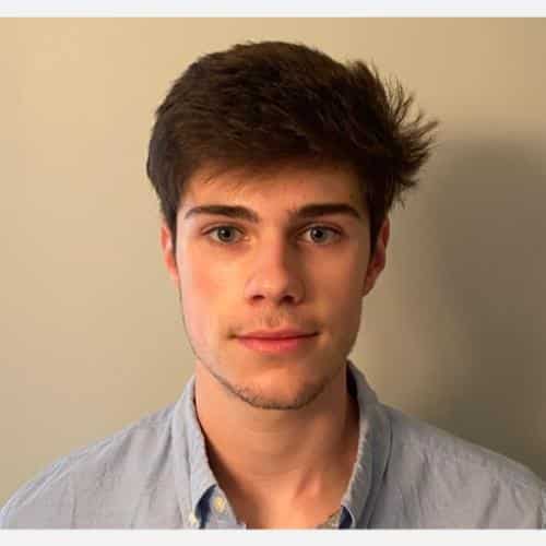 Young man with tousled hair.