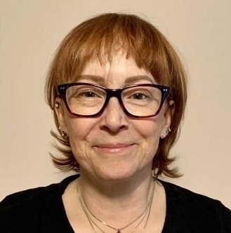 Person with short, reddish hair.